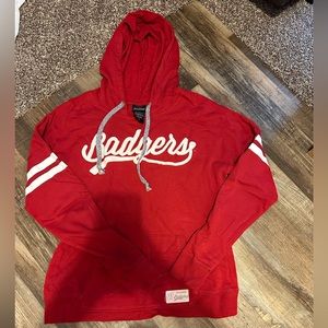 This is a badger hoodie. Color: Red.